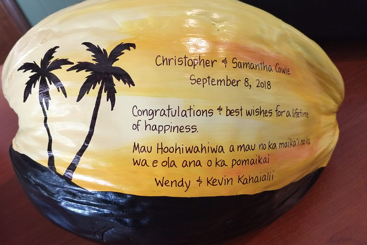 Hand painted coconuts make unique personalized anniversary gifts